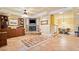 Cozy living room featuring a stone fireplace and custom built-ins at 210 Lawn Market, Sharpsburg, GA 30277