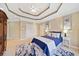 Inviting main bedroom with tray ceiling, large windows, neutral walls, and carpeted floors at 210 Lawn Market, Sharpsburg, GA 30277