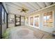 Charming screened porch with ceiling fan, open to the outside at 210 Lawn Market, Sharpsburg, GA 30277
