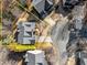 Aerial view of property boundaries showcasing the house and surrounding area with approximate lot lines at 423 Treetop Cir, Canton, GA 30115