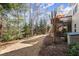 Expansive backyard featuring a blend of manicured lawn and natural wooded landscape at 423 Treetop Cir, Canton, GA 30115