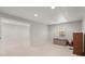 Unfurnished basement featuring neutral carpeting and an open floor plan with ample space for storage and customization at 423 Treetop Cir, Canton, GA 30115