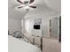 Spacious bedroom showcasing a metal bed frame, ceiling fan and a dresser with a TV at 423 Treetop Cir, Canton, GA 30115