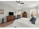 Spacious main bedroom features hardwood floors, neutral walls, and tray ceiling at 423 Treetop Cir, Canton, GA 30115