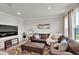 This living room is filled with natural light and features a large leather sofa at 97 Brookstone Ct, Acworth, GA 30101