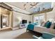 Charming bedroom featuring custom ceiling mural, plush carpet, and natural light from sliding glass doors at 1050 Carnoustie Ln, Alpharetta, GA 30005