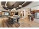 Spacious game room with pool table, kitchenette, media area, and elegant design at 1050 Carnoustie Ln, Alpharetta, GA 30005