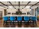 Gourmet kitchen with a large island, modern lighting, and high-end appliances, ideal for cooking and entertaining at 1050 Carnoustie Ln, Alpharetta, GA 30005