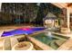Backyard pool and hot tub with outdoor seating, cabana, and elegant lighting at 1050 Carnoustie Ln, Alpharetta, GA 30005