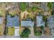 An aerial view shows a well-maintained home with a gray roof and a driveway near a road at 42 W Belle Isle Ne Rd, Atlanta, GA 30342