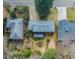 The aerial view shows a home with mature trees surrounding it for privacy and landscaping at 42 W Belle Isle Ne Rd, Atlanta, GA 30342