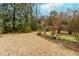 Lush backyard features a birdbath and garden, perfect for outdoor entertaining and relaxation at 42 W Belle Isle Ne Rd, Atlanta, GA 30342