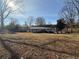 This house features a spacious backyard with a detached garage at 536 Joann Ave, Austell, GA 30168