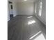 Bright and airy living room with vinyl plank flooring and fresh paint at 536 Joann Ave, Austell, GA 30168
