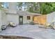 Outdoor patio features brick, greenery, with seating and furniture at 2950 Duke Of Gloucester, Atlanta, GA 30344