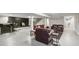 Finished basement with a bar, seating area, and staircase leading to the upper levels at 2950 Duke Of Gloucester, Atlanta, GA 30344