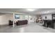 Spacious finished basement featuring a lounge area with a bar for entertainment at 2950 Duke Of Gloucester, Atlanta, GA 30344