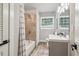 Well-lit bathroom features a tub/shower combo and modern vanity at 2950 Duke Of Gloucester, Atlanta, GA 30344