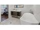 Modern bath with tub, vanity, and stylish finishes at 2950 Duke Of Gloucester, Atlanta, GA 30344