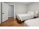 Cozy bedroom featuring hardwood floors, natural light, and two twin beds at 2950 Duke Of Gloucester, Atlanta, GA 30344
