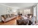 Living room features hardwood floors, neutral walls and comfortable seating at 2950 Duke Of Gloucester, Atlanta, GA 30344