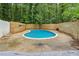 Private in-ground pool surrounded by a well-maintained patio and a privacy fence at 2950 Duke Of Gloucester, Atlanta, GA 30344
