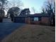Lovely single-story home featuring a side-entry garage and neatly kept front lawn at 9031 Thornton Rd, Jonesboro, GA 30236