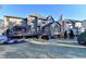 Expansive backyard featuring a spacious deck and mature landscaping, perfect for outdoor entertaining at 420 Woodbrook Way, Lawrenceville, GA 30043