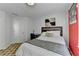 Bright bedroom featuring a bed, carpet, desk and a window at 420 Woodbrook Way, Lawrenceville, GA 30043