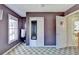 Neutral bedroom featuring a closet, window, and door at 420 Woodbrook Way, Lawrenceville, GA 30043