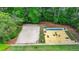 Aerial view of the community games, which includes a volleyball court, shuffle board, and corn hole area at 420 Woodbrook Way, Lawrenceville, GA 30043