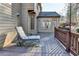 Secluded deck area with a lounge chair, perfect for unwinding in a tranquil setting at 420 Woodbrook Way, Lawrenceville, GA 30043