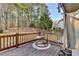 Cozy deck area with a comfortable hanging chair, perfect for relaxing and enjoying the peaceful surroundings at 420 Woodbrook Way, Lawrenceville, GA 30043