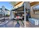 Charming deck featuring a cozy seating area with a pergola, perfect for outdoor gatherings and relaxation at 420 Woodbrook Way, Lawrenceville, GA 30043