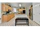 Kitchen with granite countertops, wood cabinets, stainless steel appliances, and breakfast bar at 420 Woodbrook Way, Lawrenceville, GA 30043