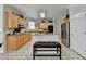 Kitchen with stainless steel appliances, an island, and a dining area at 420 Woodbrook Way, Lawrenceville, GA 30043
