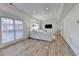 Bright living room featuring hardwood floors, recessed lighting and large windows at 420 Woodbrook Way, Lawrenceville, GA 30043