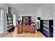Spacious office with custom built-ins, hardwood flooring, and plenty of natural light at 420 Woodbrook Way, Lawrenceville, GA 30043