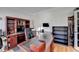 Open office space with hardwood floors, built-in storage, and natural light at 420 Woodbrook Way, Lawrenceville, GA 30043