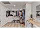 Walk-in closet with extensive shelving and drawer storage at 420 Woodbrook Way, Lawrenceville, GA 30043