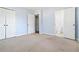 A basic bedroom with two closets and access to an on-suite bathroom at 8331 Attica Ct, Jonesboro, GA 30238