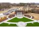 Piedmont Bank Amphitheater with manicured green lawn and walkways create a welcoming space for outdoor events at 1117 Mountain Springs Nw Dr, Kennesaw, GA 30144