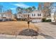 Charming two-story home with a two-car garage and mature landscaping at 1117 Mountain Springs Nw Dr, Kennesaw, GA 30144