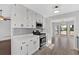 Well-appointed kitchen with stainless steel appliances and white cabinetry at 1117 Mountain Springs Nw Dr, Kennesaw, GA 30144