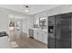 Modern kitchen featuring white cabinets and stainless steel appliances at 1117 Mountain Springs Nw Dr, Kennesaw, GA 30144