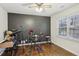 Bedroom featuring a dark accent wall, and hardwood floors at 1524 Chateau Dr, Dunwoody, GA 30338