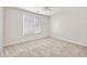 Bright bedroom featuring neutral carpet, a ceiling fan, and a window with blinds at 170 Maple View Ct, Dallas, GA 30157