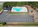 An aerial view of a community pool, playground, parking lot, and amenities at 170 Maple View Ct, Dallas, GA 30157