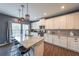 Bright kitchen with stainless steel appliances, granite countertops, and a center island at 1935 Azure Grove Ct, Marietta, GA 30008