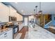 Bright, modern kitchen with granite countertops, stainless steel appliances, and custom cabinetry at 1935 Azure Grove Ct, Marietta, GA 30008